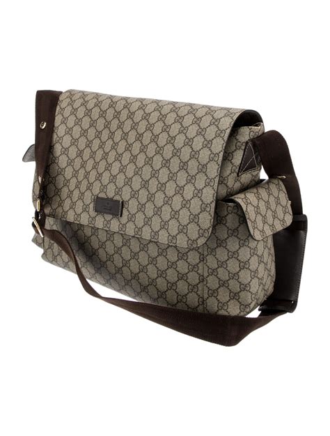 gucci gg supreme wolf print diaper bag brown